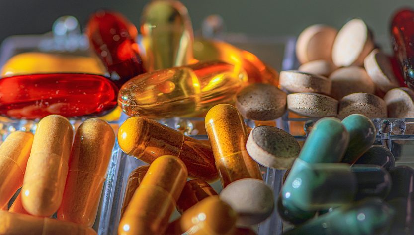 Vitamins, pills, pharmacy — Recover Right: How Lumbar Support Aids Healing After Back Surgery