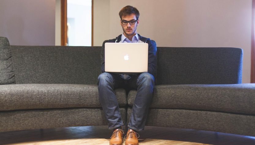 Man, laptop, businessman — Social Security Helping Citizens Navigate Benefit Options With Confidence