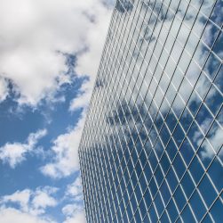Building, reflection, clouds — White Label SEO vs. Private Label SEO: What's the Difference?